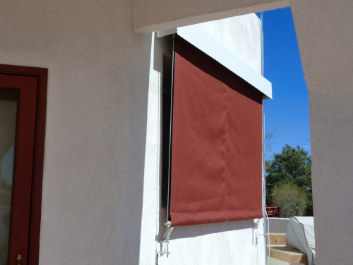 Vertical Roll Curtain with exterior hood and side cables- Rader Awning